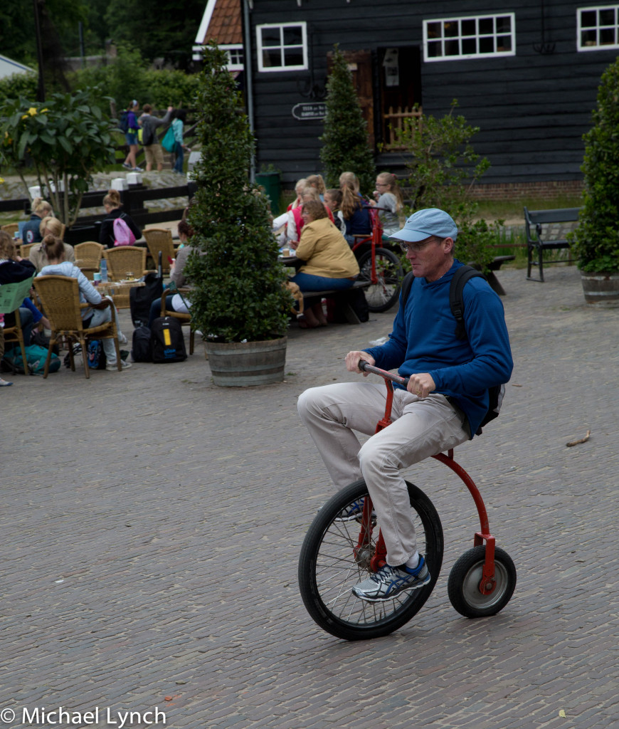 Phil riding an old style bike