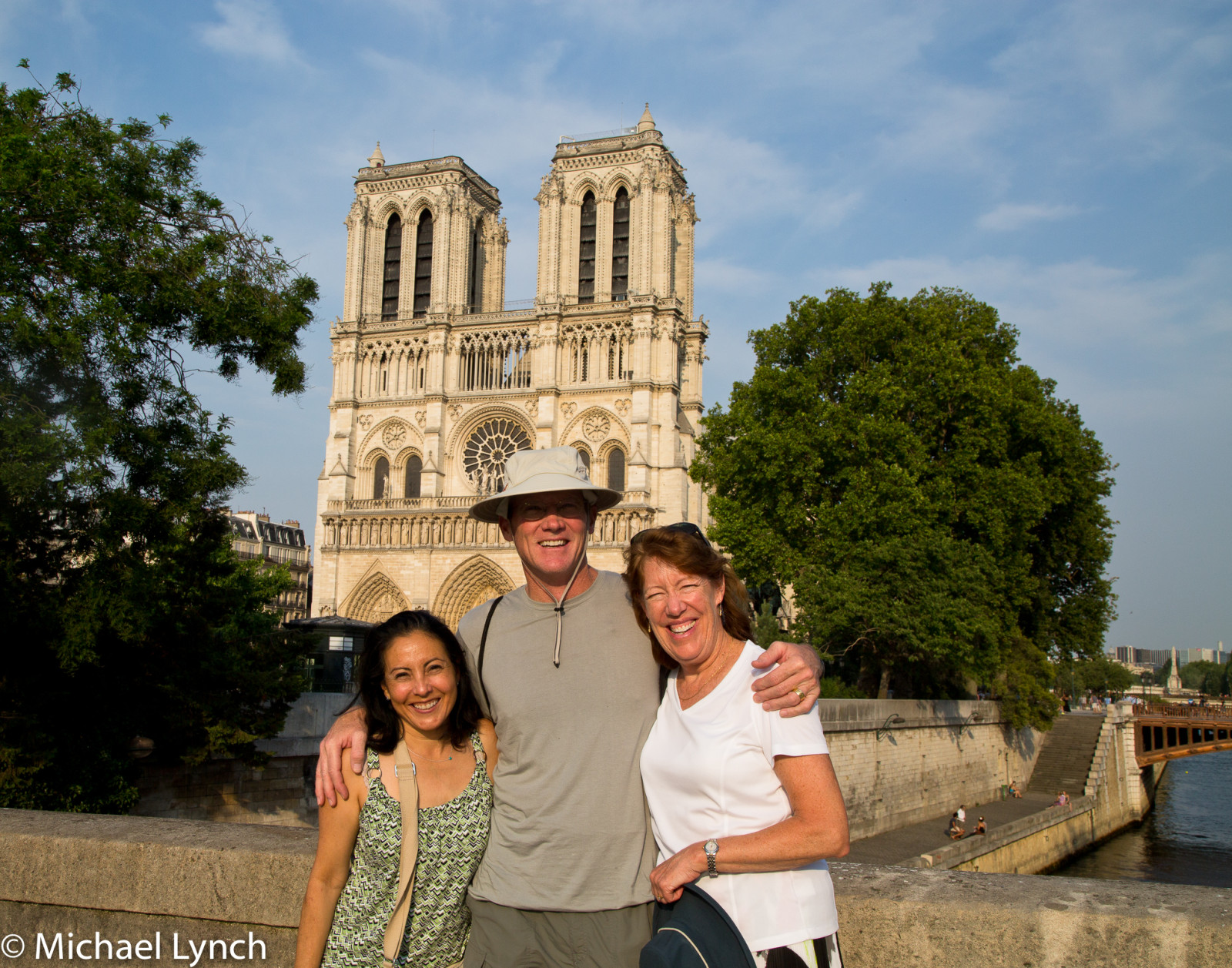 Veronica, Phil, and Sharon in front of Notre Dame